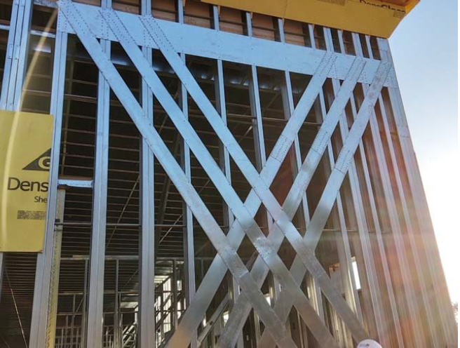 Photo 1 - Exterior View of Woven X-Brace Gusset and Straps - Courtesy of Structural Evolutions