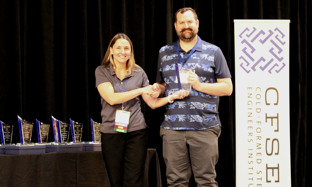 Derek Putz, P.E., American Way Engineering  Accepts the CFSEI Design Excellence First Place Award, Commercial Category Presented by Tammy Gleed, P.E., CFSEI Immediate Past Chair 