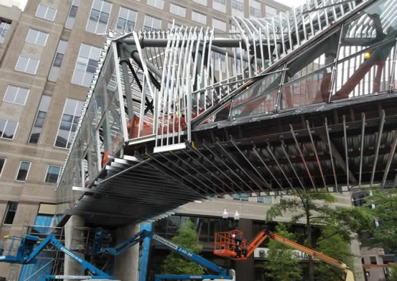 Exterior Picture of Curved Stud Profile and Soffit Framing Underneath the Bridge. Photo courtesy of ADTEK Engineers, Inc.